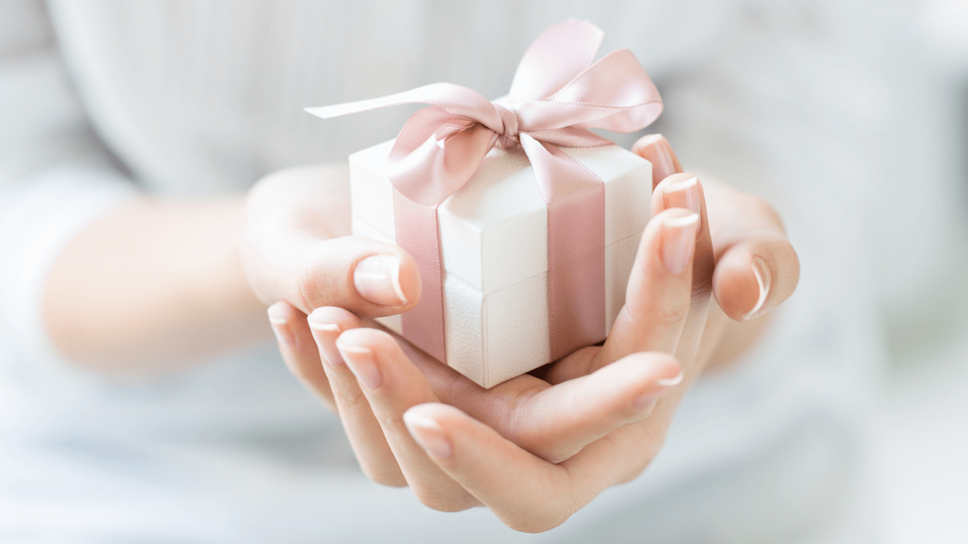 Hands holding a gift