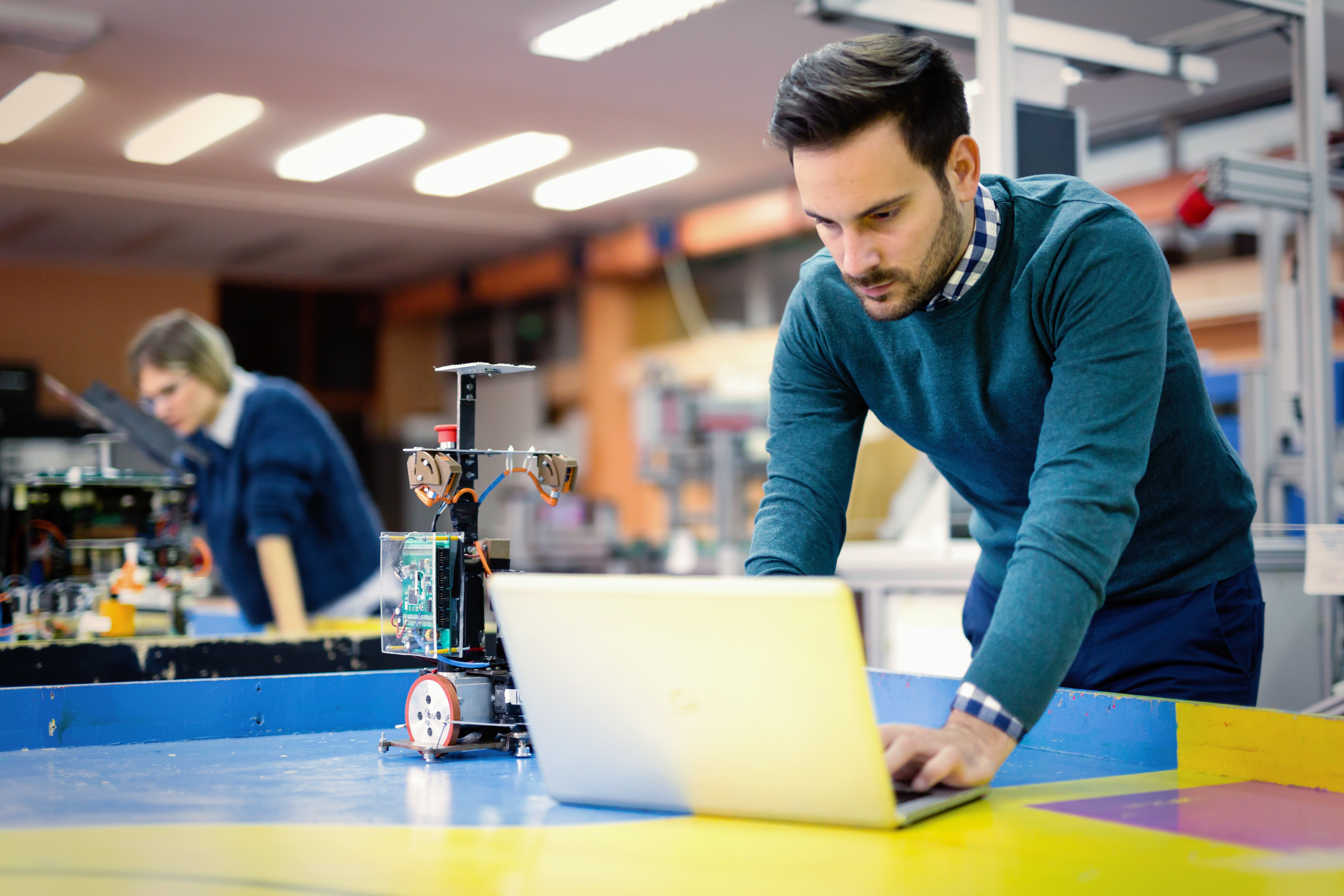 young-student-of-mechatronics-working-on-project-2FWX6ZK-1